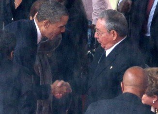 The White House said President Barack Obama and Cuba’s President Raul Castro's handshake at Nelson Mandela's memorial service was unplanned