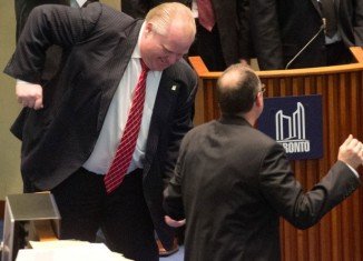 Toronto Mayor Rob Ford has been filmed dancing in the City Council to songs including Bob Marley's One Love