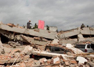 Dozens are feared trapped after the three-storey structure collapsed in the town of Canacona