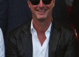 Eddie Irvine has been sentenced to six months in prison by an Italian court after a brawl with a man in a Milan nightclub