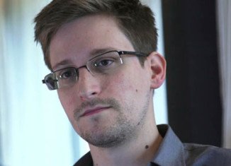 Edward Snowden has said he has "no chance" of a fair trial in the US and has no plans to return there