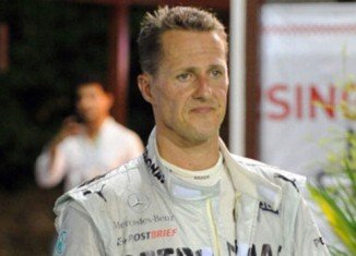 French doctors treating injured Michael Schumacher in Grenoble hospital are reducing his sedation to prepare to bring him out of a coma