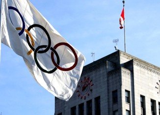 Indian athletes participating at next month's Winter Games in Sochi will compete under the Olympic flag