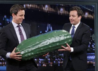 Jimmy Fallon officially handed-off the traditional Late Night giant plastic pickle to Seth Meyers