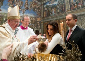 Pope Francis baptized 32 infants at a Vatican ceremony