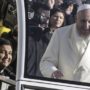 Pope Francis invites old friend to take a ride on Popemobile