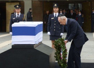Thousands of mourners paid their final respects to Ariel Sharon