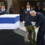 Ariel Sharon funeral: Coffin lay in state outside parliament building in Jerusalem