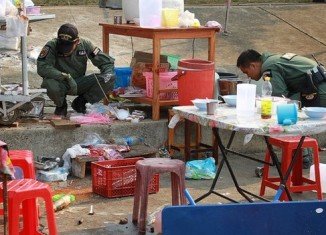 Attackers threw grenades and sprayed the crowd with bullets at a night market in the Khao Saming district of Trat province