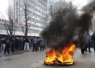 Bosnia-Herzegovina protesters have set fire to government buildings as violent protests continue across the country for a third day