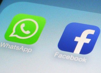 Facebook buys messaging app WhatsApp in a deal worth a total of $19 billion in cash and shares