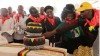 Huge cakes were on display in the centre of the stadium in Marondera, while the crowd wore red scarves, as is traditional on Robert Mugabe's birthday