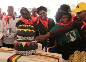 Huge cakes were on display in the centre of the stadium in Marondera, while the crowd wore red scarves, as is traditional on Robert Mugabe's birthday