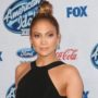 Jennifer Lopez in crop top in Rio with Casper Smart after her dressing room was robbed