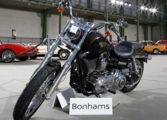 Pope Francis’ Harley-Davidson has been sold for 210,000 euros at Bonhams auction in Paris