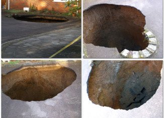 The 30ft deep sinkhole has opened up on the driveway of a house in High Wycombe