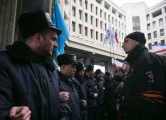 Two Ukraine’s government buildings have been seized by armed men in Simferopol
