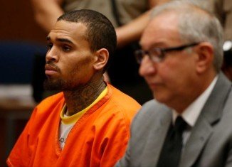 Chris Brown has been ordered to stay in jail until a hearing on April 23 following his rehab arrest