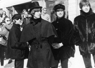 Jackets worn by George Harrison and Ringo Starr in The Beatles' 1965 film Help! have fetched £115,000 at Liverpool auction