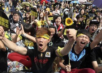 More than 100,000 people have taken to the streets of capital Taipei, to protest against a controversial trade agreement with China