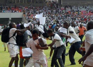 Nigeria stampede among jobseekers taking a recruitment test in the national stadium in Abuja