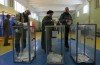 Some 95.5 percent of voters in Crimea have supported joining Russia in a disputed referendum