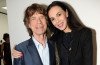 The Rolling Stones have cancelled the first date of their On Fire tour in Australia following the death of Mick Jagger's girlfriend L'Wren Scott