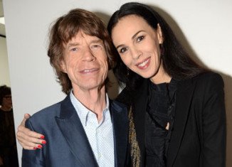 The Rolling Stones have cancelled the first date of their On Fire tour in Australia following the death of Mick Jagger's girlfriend L'Wren Scott