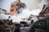 Three people have died and nine are missing after a gas leak sparked an explosion which leveled two buildings in East Harlem