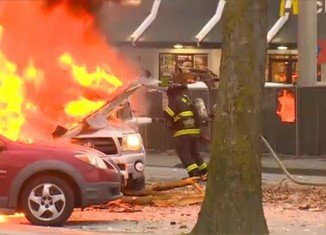 Two people died after a KOMO news helicopter crashed in central Seattle at the foot of the landmark Space Needle