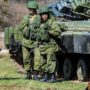 Vladimir Putin orders partial withdrawal of Russian troops from Ukraine border