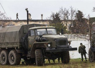 Warning shots have been fired in Armyansk as a team of OSCE observers was turned back from entering Crimea