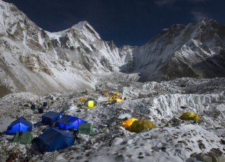 About half of expedition teams at Everest base camp are descending amid uncertainty over this year's climbing season