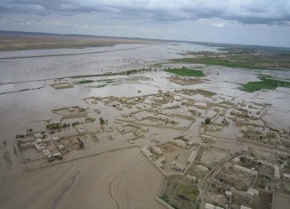 Fifty-eight people have been killed and hundreds of villagers left stranded in devastating flash floods in northern Afghanistan