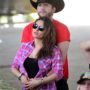 Mila Kunis shows off baby bump at Stagecoach Music Festival in Indio