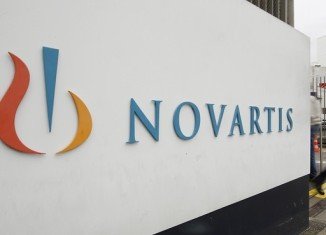 Novartis will acquire GSK's oncology drugs business for $16 billion and sell its vaccines division, excluding the flu unit, to GSK for $7.1 billion