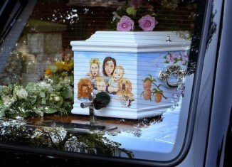 Peaches Geldof’s blue coffin was adorned with a painted picture of herself, her husband, their two young sons and pet dogs