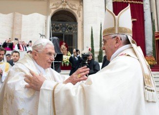 Pope Emeritus Benedict XVI and Pope Francis during Mass before the canonization ceremony of Popes John XXIII and John Paul II