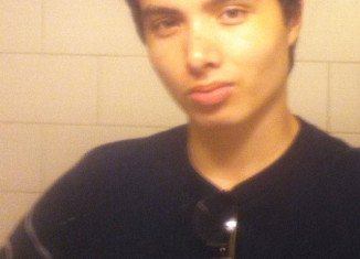 After exchanging gunfire with police, Elliot Rodger was found dead inside his crashed vehicle with a gunshot wound to the head