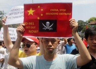 Anti-China protesters have set on fire several factories at Vietnam Singapore Industrial Park