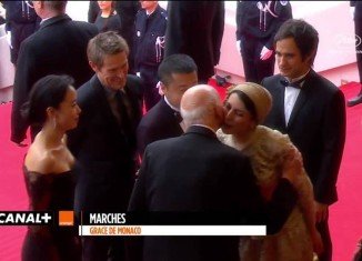 Cannes Film Festival president Gilles Jacob has played down a backlash in Iran after he kissed Iranian actress Leila Hatami on the cheek