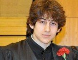 Dzhokhar Tsarnaev wrote a note as he emerged from the boat where he had hidden from investigators