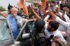 Narendra Modi was cheered by supporters after a victory parade from Delhi airport