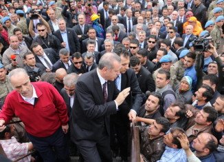 People in Soma hurled abuse as they surrounded PM Recep Tayyip Erdogan's car during his visit to the scene of the tragedy