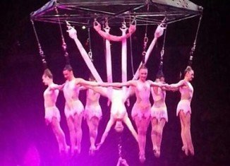 The collapse occurred during an act in which the eight performers hanged from their hair like a human chandelier