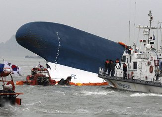 The confirmed death toll from the Sewol ferry disaster has reached 244