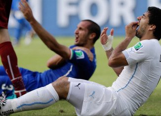FIFA has banned Uruguay striker Luis Suarez for nine matches after being found guilty of biting Italian defender Giorgio Chiellini