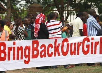 Nigerian authorities have banned public protests in the capital Abuja for the release of more than 200 schoolgirls seized by Islamist militants