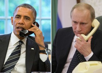 President Barack Obama has urged Russian President Vladimir Putin to stop the flow of weapons into Ukraine and halt support for separatists