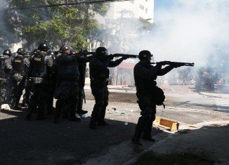 Sao Paulo riot police have used tear gas to break up a protest against Brazil’s World Cup, hours before the opening match